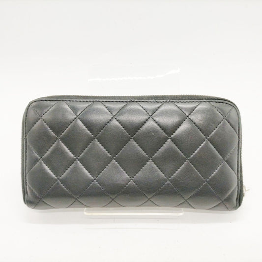 CHANEL - Quilted Large Gasset Zip Around Wallet